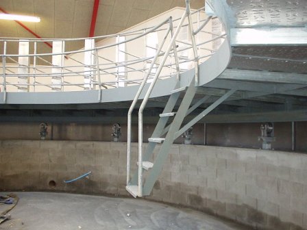Steel platform with centre pit and stair access 